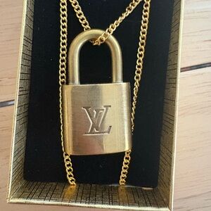 Louis Vuitton Gold Padlock on 18” gold- tone Necklace